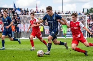 Fotbal dorost ročník — Rozdělení kategorií U16–U19 | FotbalovýDres.cz 13 Fotbal dorost ročník — Rozdělení kategorií U16–U19 | FotbalovýDres.cz (Obrázek vygenerovaný umělou inteligencí)